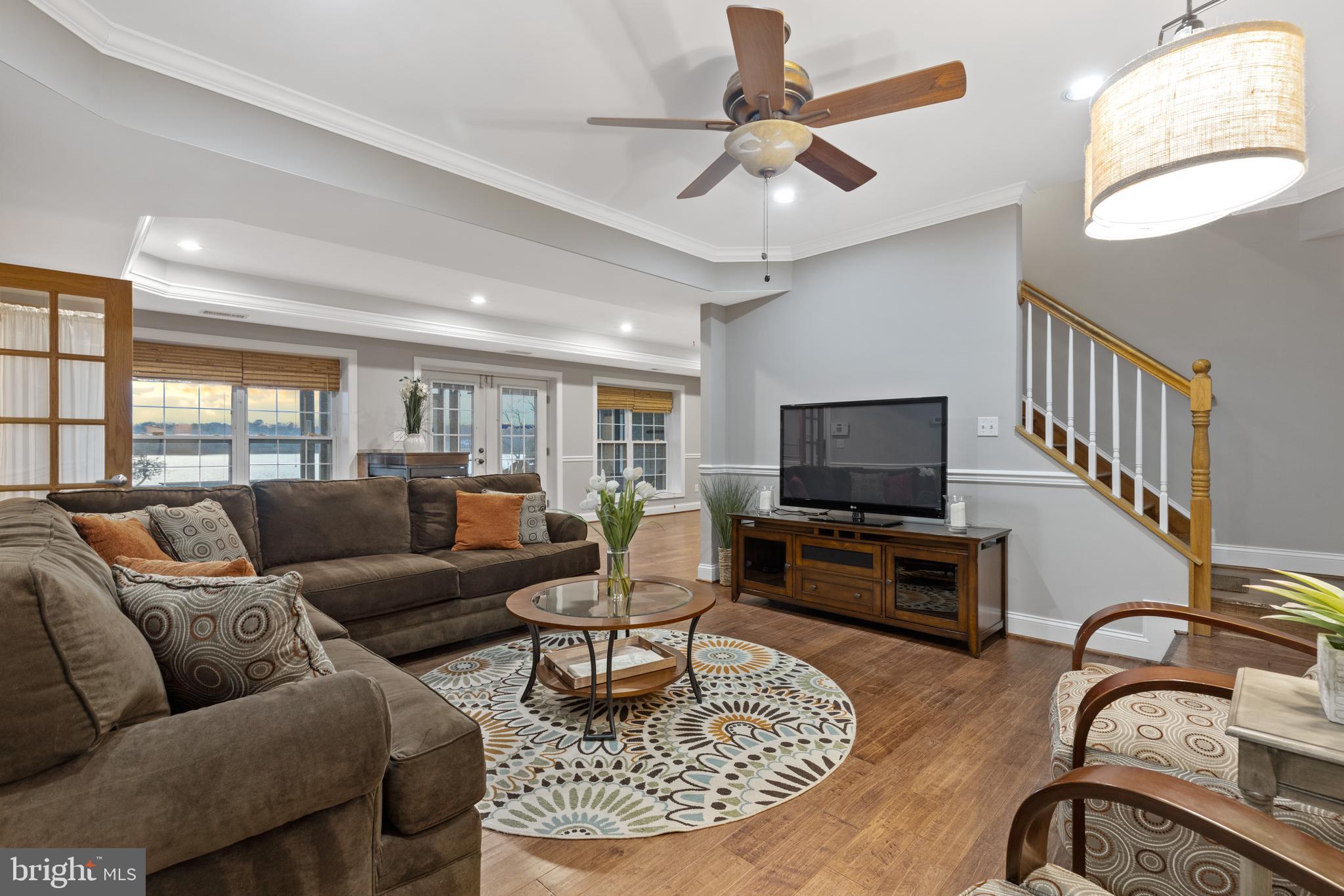 7800 Burgess Road Pasadena, MD 21122 - Photo 36 of 77 Finished basement living area w/HW floors