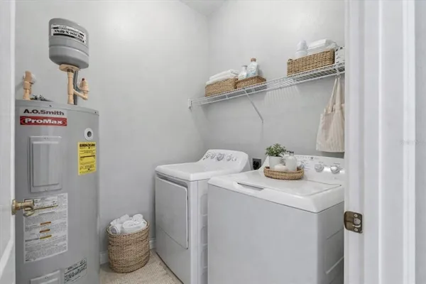 an empty room with a empty space and a ceiling fan