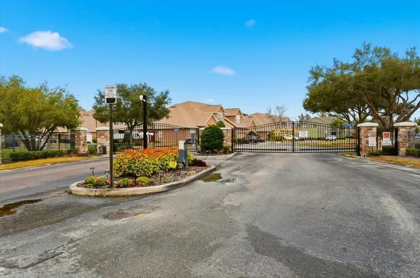 a tall building with trees in front of it