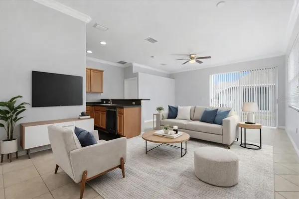 a view of an empty room with a kitchen