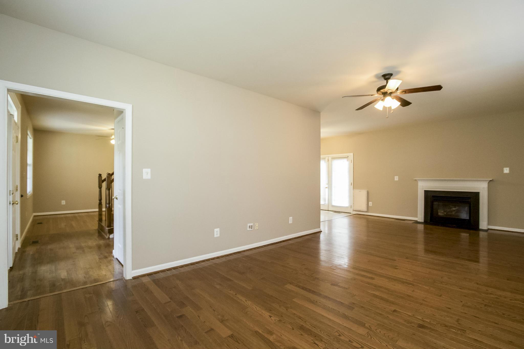 11706 Smithfield Road Manassas, VA 20112 - Photo 2 of 25 Living Room w/ Hardwood Flooring!