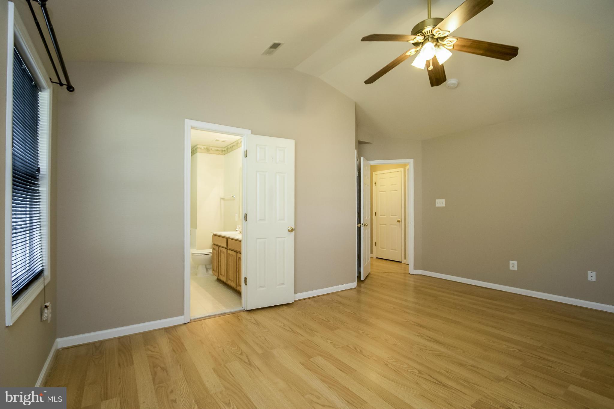 11706 Smithfield Road Manassas, VA 20112 - Photo 11 of 25 Master Bedroom w/Laminate Hardwood Flooring!