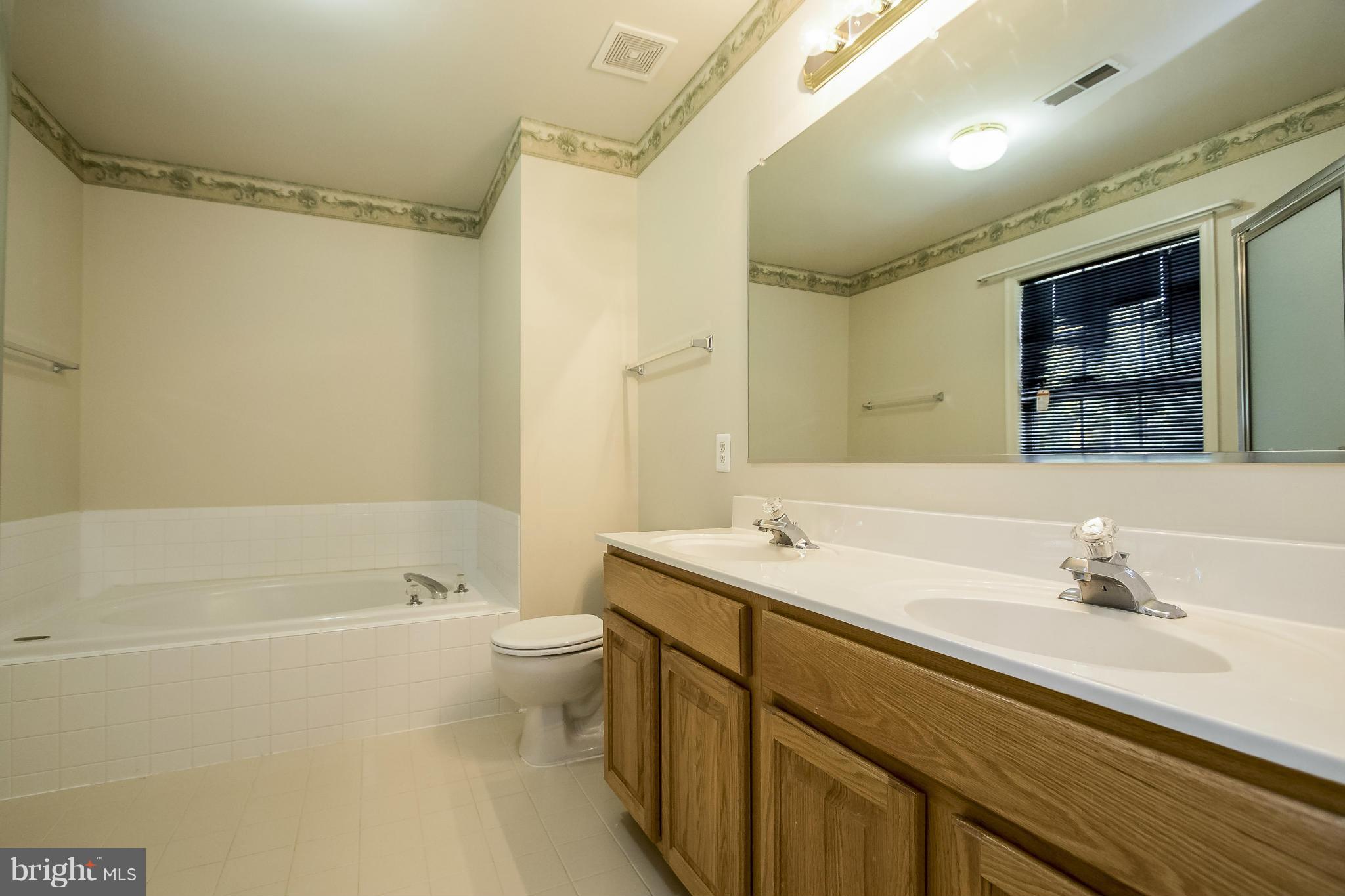 11706 Smithfield Road Manassas, VA 20112 - Photo 12 of 25 Master Bath w/Soaking Tub and Double Sink Vanity!