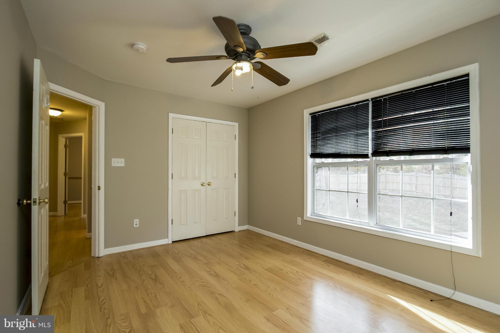 11706 Smithfield Road Manassas, VA 20112 - Photo 15 of 25 Bedroom #2 with Laminate Hardwood Flooring!