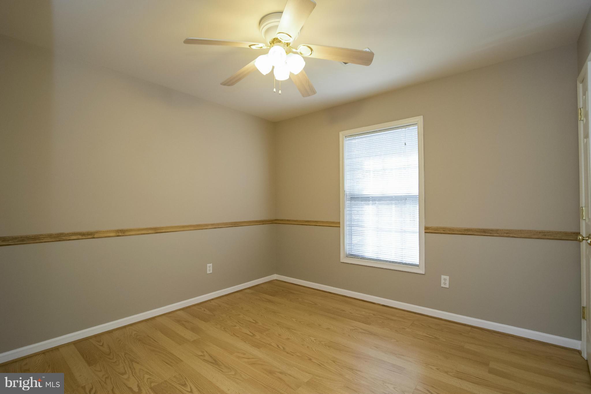 11706 Smithfield Road Manassas, VA 20112 - Photo 17 of 25 Bedroom #3 with Laminate Hardwood Flooring!
