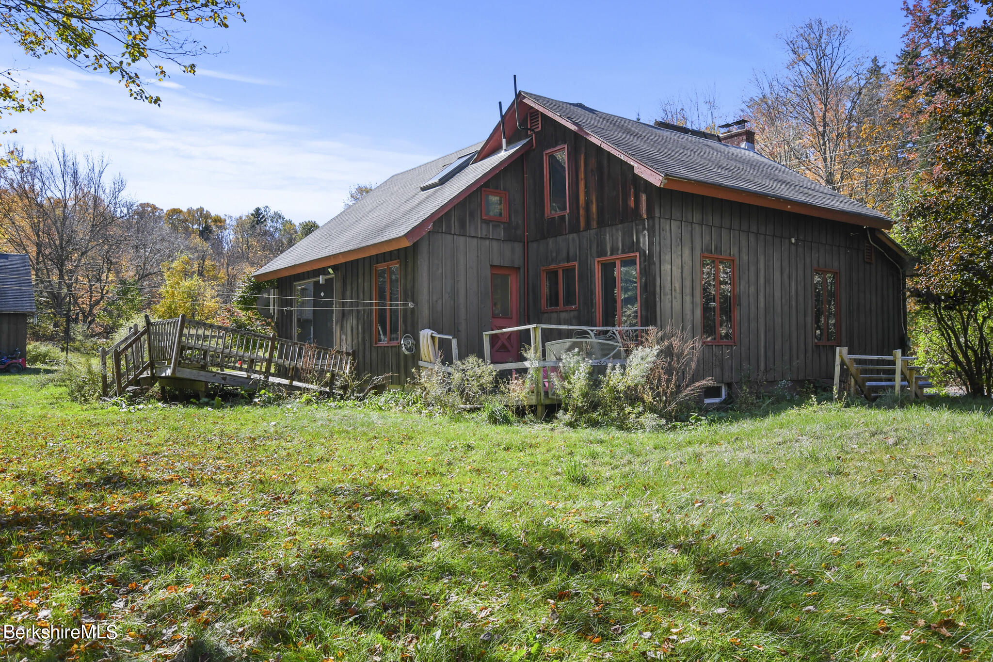 74 Old Main Road Savoy, MA 01256 - Photo 10 of 42 a front view of a house with garden