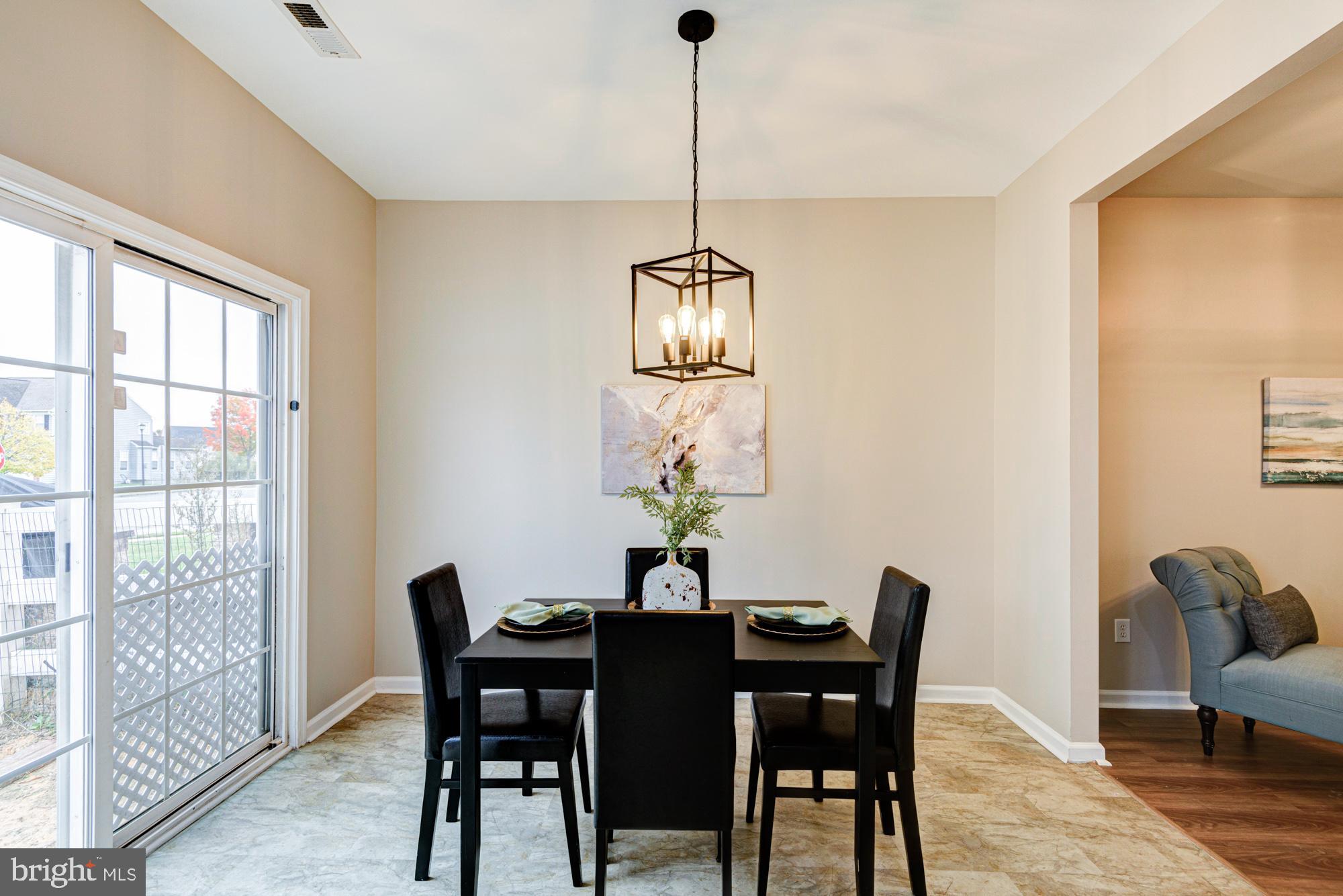 164 Springfield Circle Middletown, DE 19709 - Photo 14 of 49 a dining room with furniture and window
