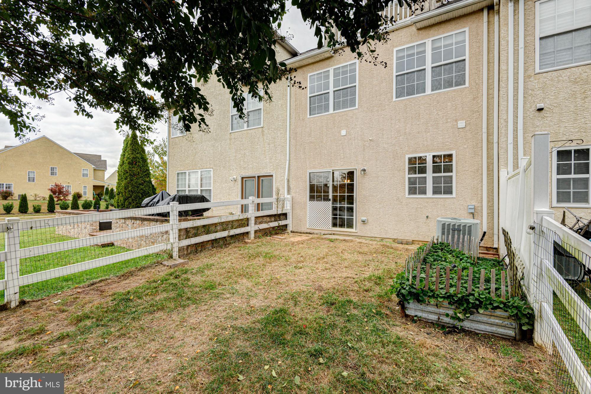 164 Springfield Circle Middletown, DE 19709 - Photo 19 of 49 a house view with a garden space