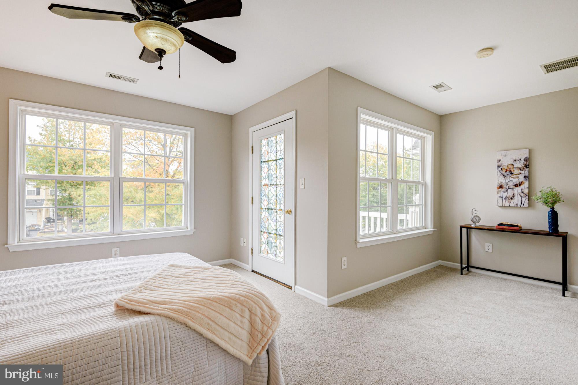 164 Springfield Circle Middletown, DE 19709 - Photo 24 of 49 a spacious bedroom with a bed and a window