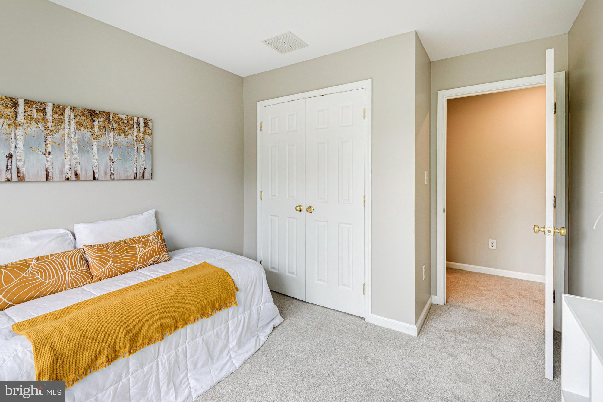 164 Springfield Circle Middletown, DE 19709 - Photo 29 of 49 a bedroom with a bed and wall painting