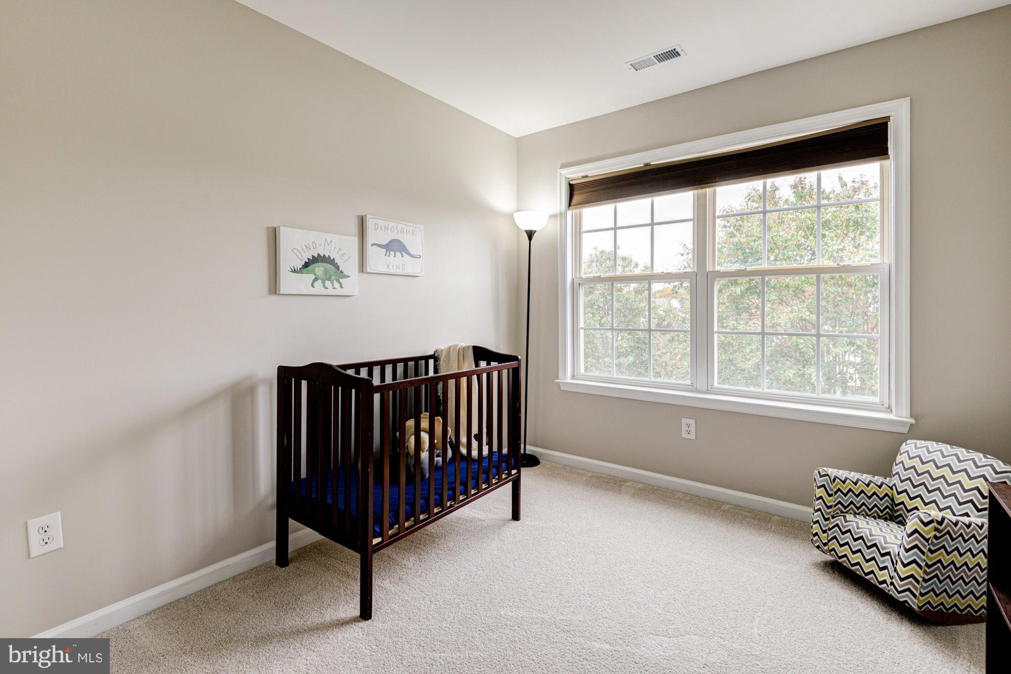 164 Springfield Circle Middletown, DE 19709 - Photo 30 of 49 a bedroom with furniture and a window