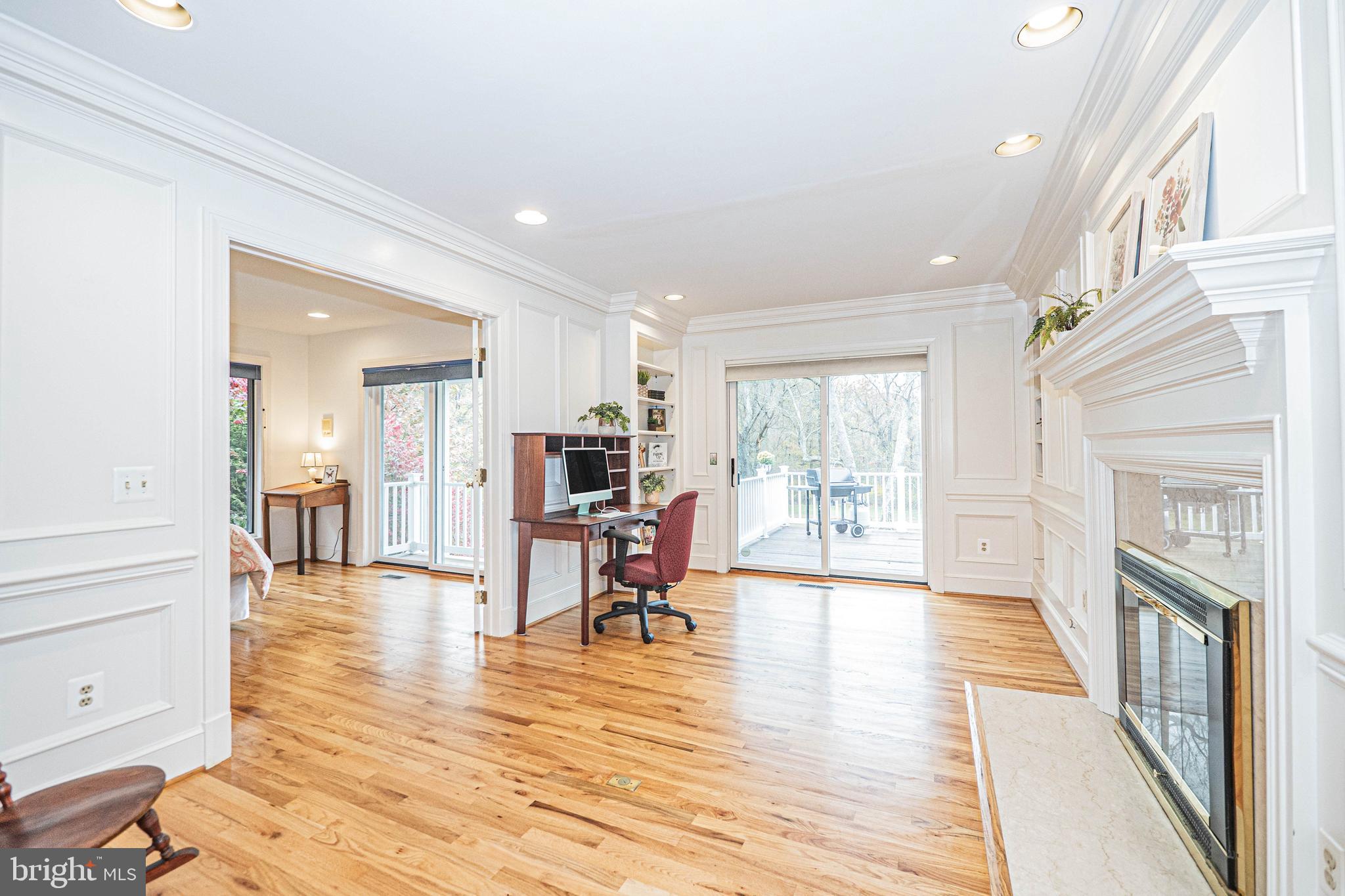 10100 Watkins Road Gaithersburg, MD 20882 - Photo 49 of 113 a living room with furniture and a fireplace