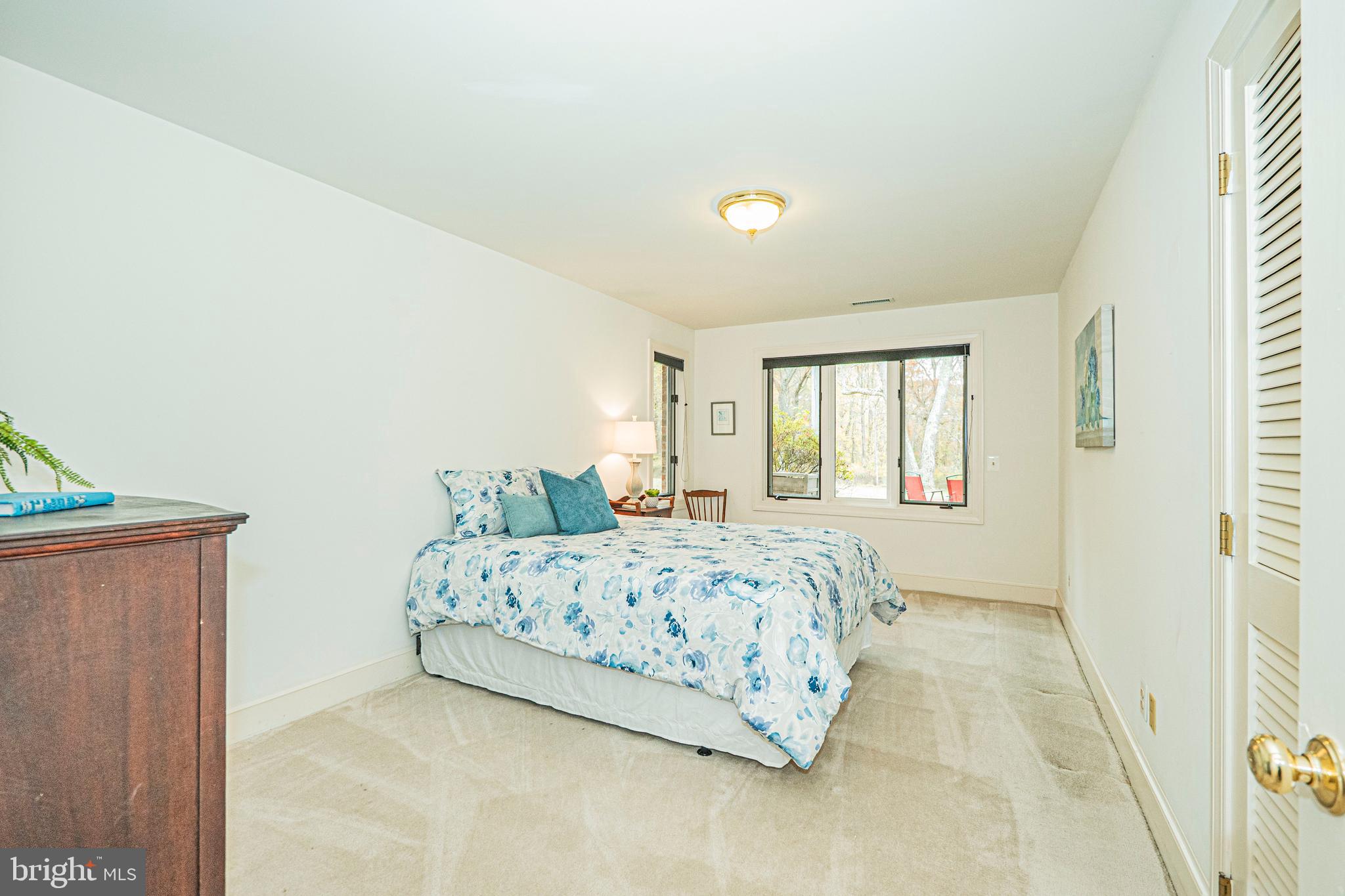 10100 Watkins Road Gaithersburg, MD 20882 - Photo 78 of 113 a bedroom with a bed and a window