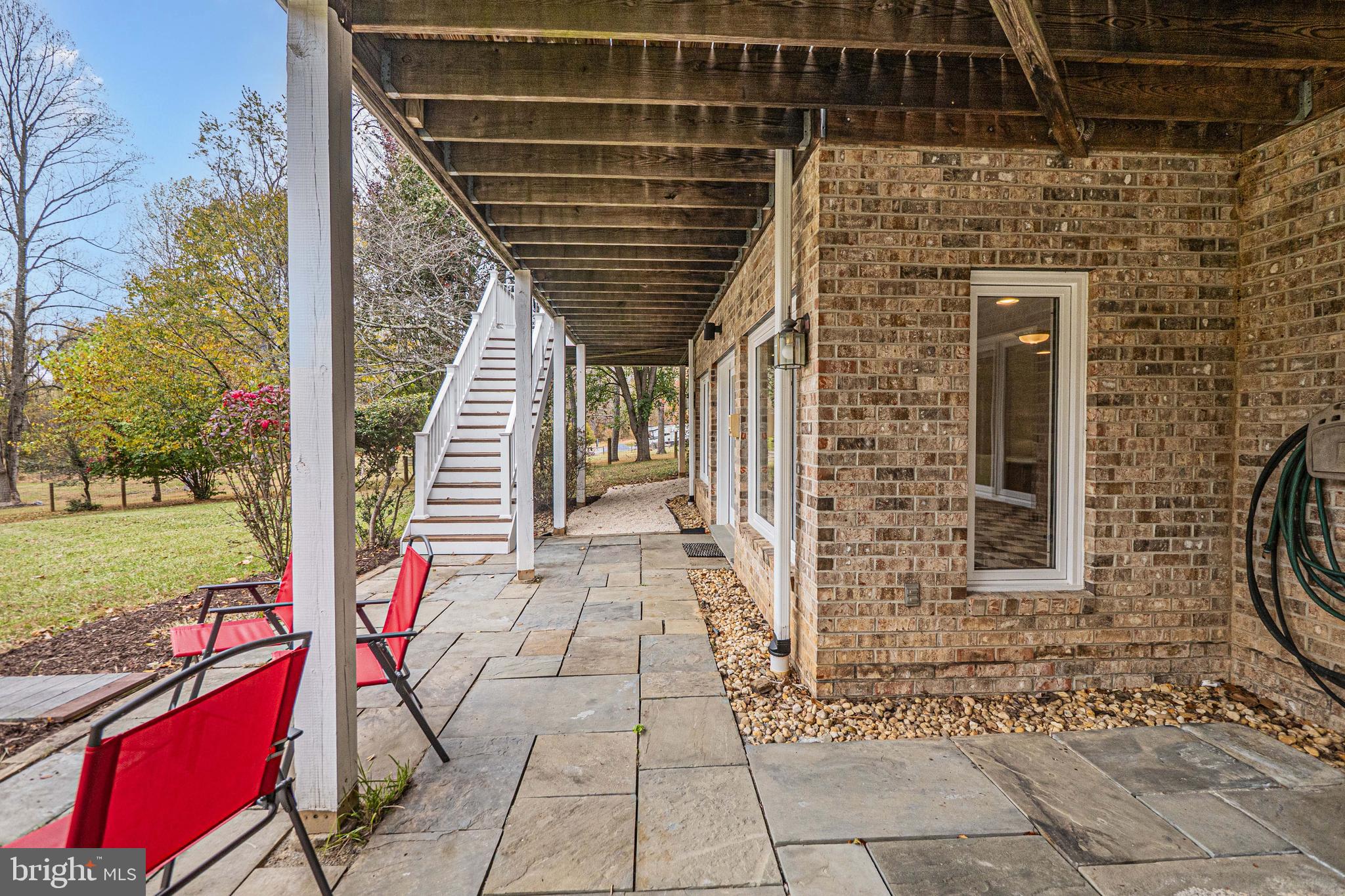 10100 Watkins Road Gaithersburg, MD 20882 - Photo 87 of 113 a front view of a house with garden