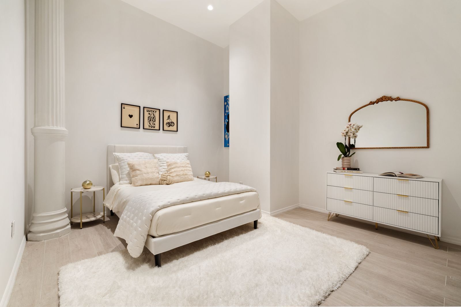 Undisclosed Address Manhattan, NY 10012 - Photo 9 of 12 a bedroom with a bed and a dresser