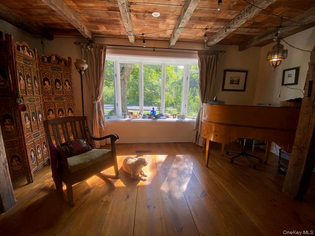 1640-1642 Bulls Head Road Clinton Corners, NY 12514 - Photo 8 of 19 a living room with furniture and a large window