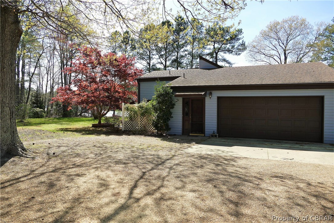 895 Holly Point Road Mathews, VA 23109 - Photo 43 of 47 a house with yard in front of it