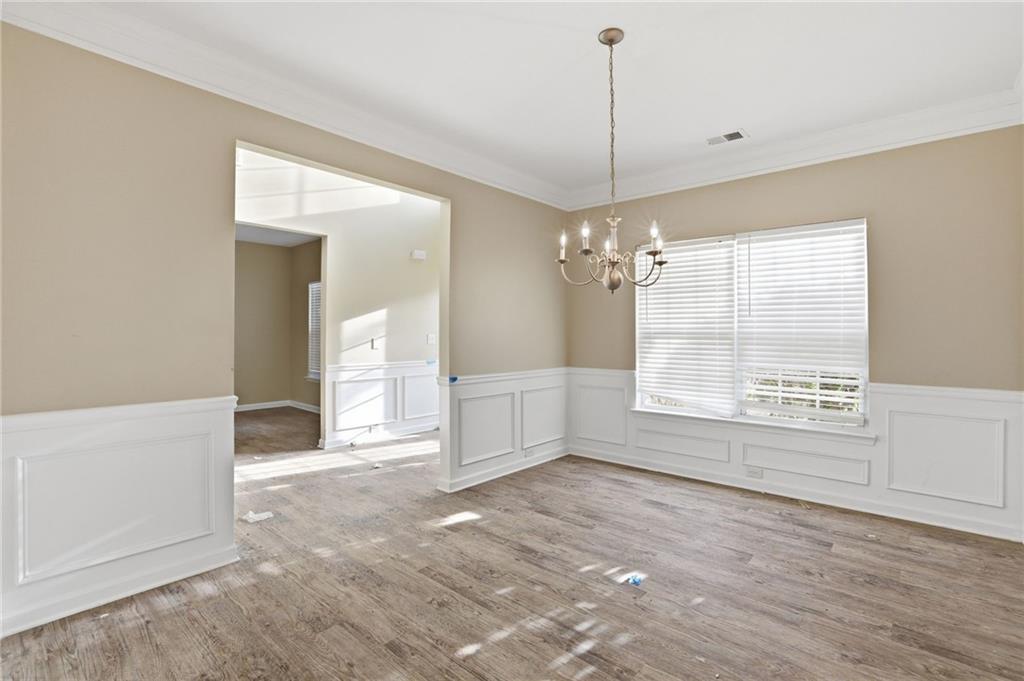 4968 Locherby Drive Fairburn, GA 30213 - Photo 13 of 39 a view of an empty room with a window