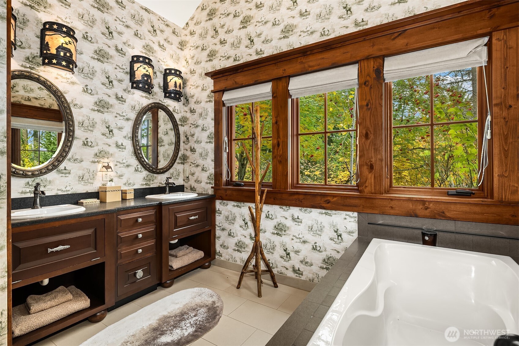 50 Scatter Creek Loop Cle Elum, WA 98922 - Photo 25 of 39 a bathroom with a granite countertop sink and a large mirror