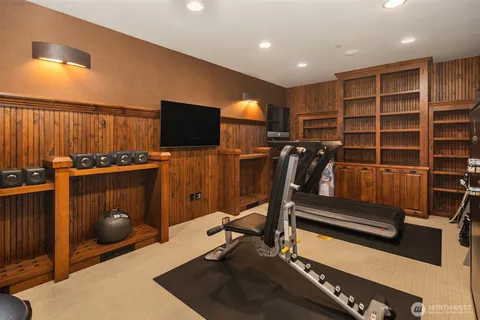 a view of a house with a big yard and potted plants