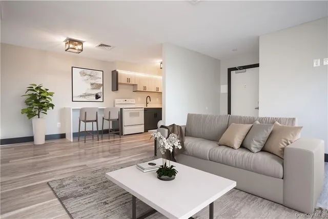 a bathroom with a toilet a sink and a mirror