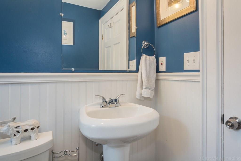 148 Sterling Road Lancaster, MA 01523 - Photo 13 of 39 a bathroom with a sink and a mirror