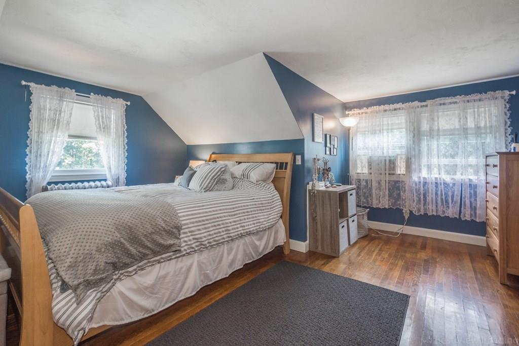 148 Sterling Road Lancaster, MA 01523 - Photo 17 of 39 a bedroom with a bed and a window