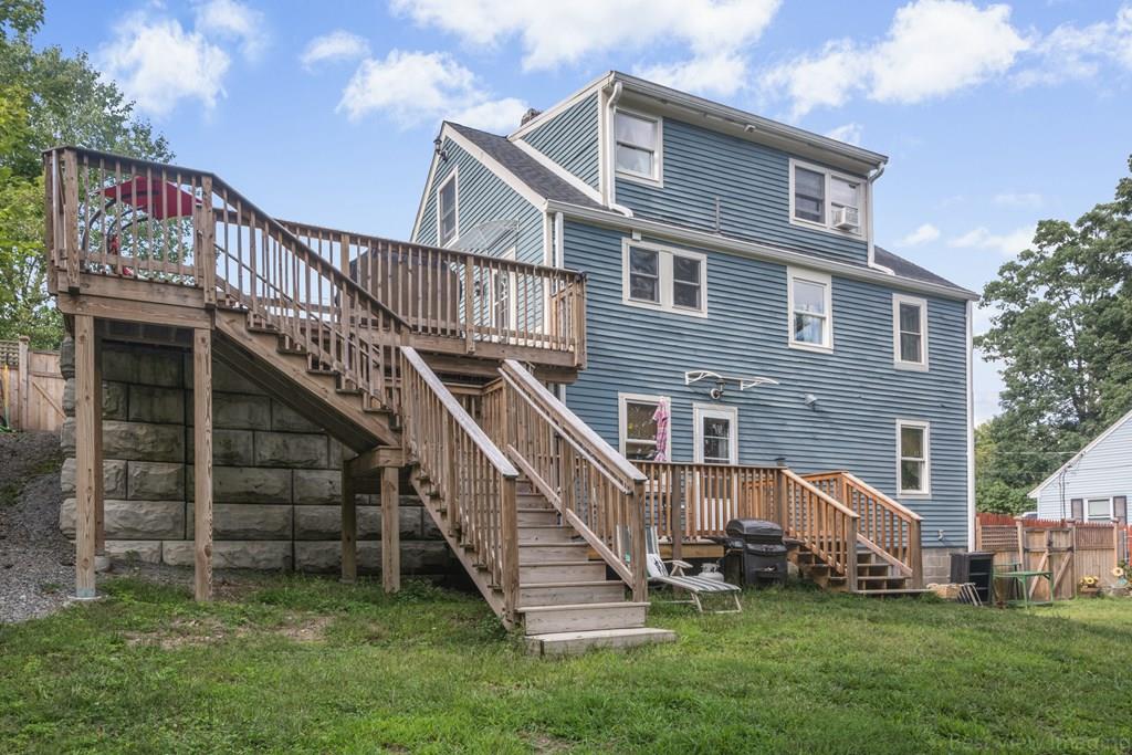 148 Sterling Road Lancaster, MA 01523 - Photo 2 of 39 a view of a house with a yard
