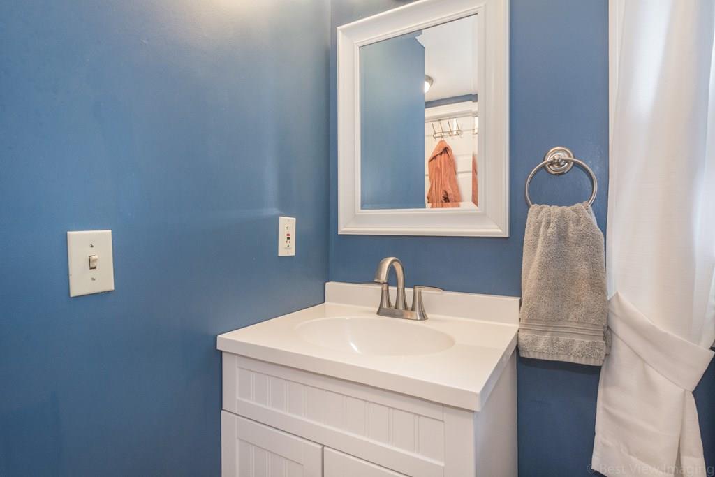 148 Sterling Road Lancaster, MA 01523 - Photo 24 of 39 a bathroom with a sink and a mirror