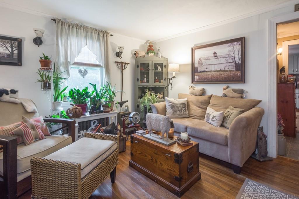 148 Sterling Road Lancaster, MA 01523 - Photo 26 of 39 a living room with furniture potted plant and window