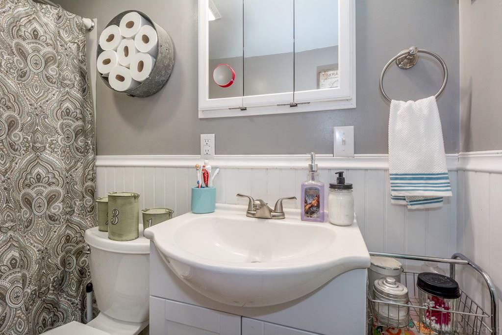148 Sterling Road Lancaster, MA 01523 - Photo 33 of 39 a bathroom with a sink and a mirror