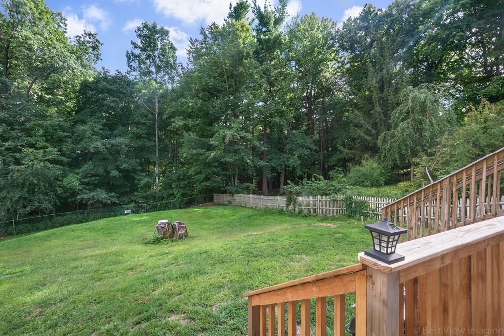 148 Sterling Road Lancaster, MA 01523 - Photo 39 of 39 a view of backyard with green space