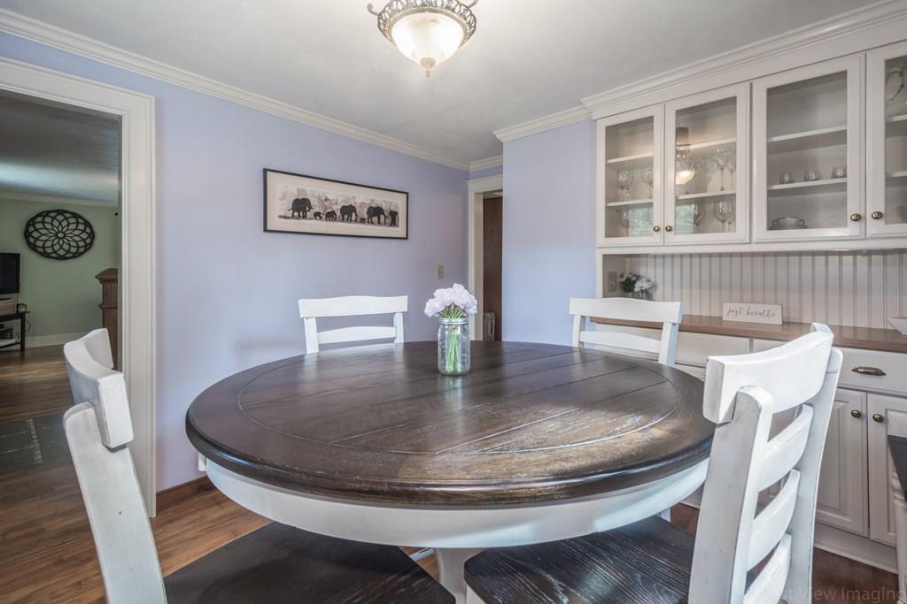 148 Sterling Road Lancaster, MA 01523 - Photo 8 of 39 a view of a dining room with furniture