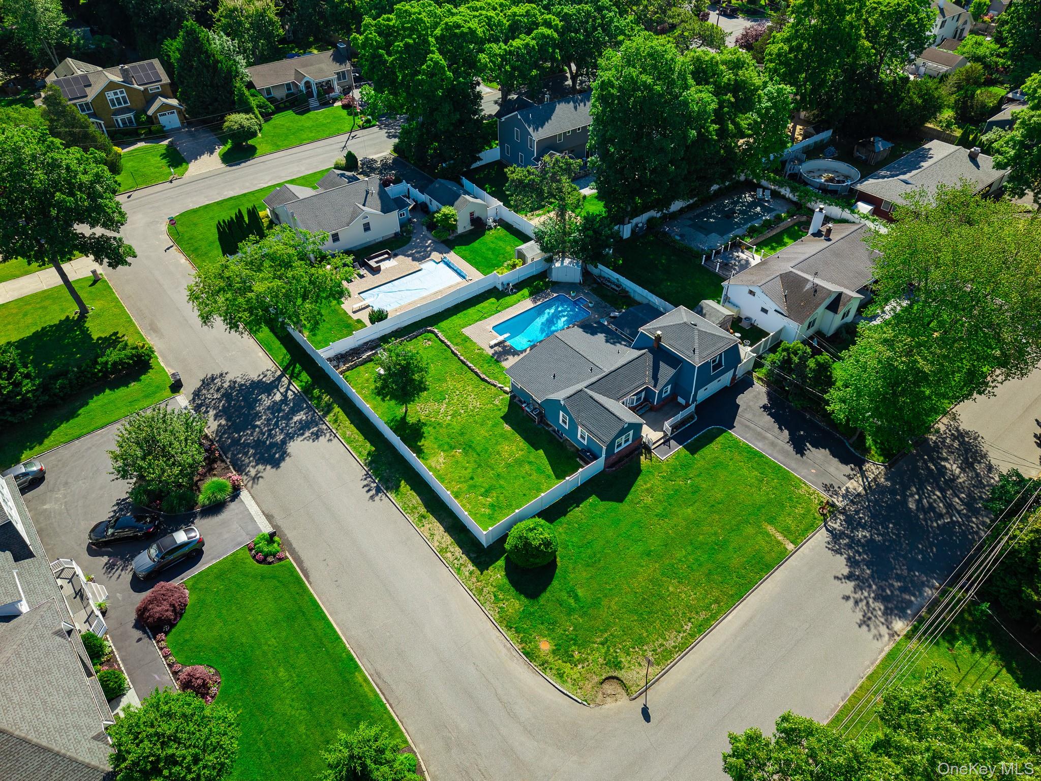 33 Lillian Road Nesconset, NY 11767 - Photo 39 of 42 Aerial View Showing The Large Corner Property With A Very Large, Fully PVC Fenced Backyard & The Saltwater In Ground Pool.