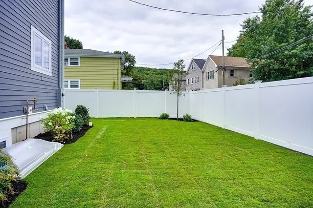 a view of a house with a garden