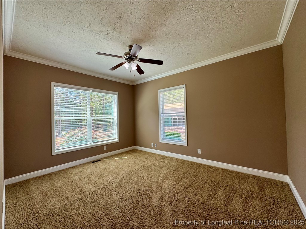 3273 Cameron Hill Road Cameron, NC 28326 - Photo 27 of 36 a view of an empty room with a window