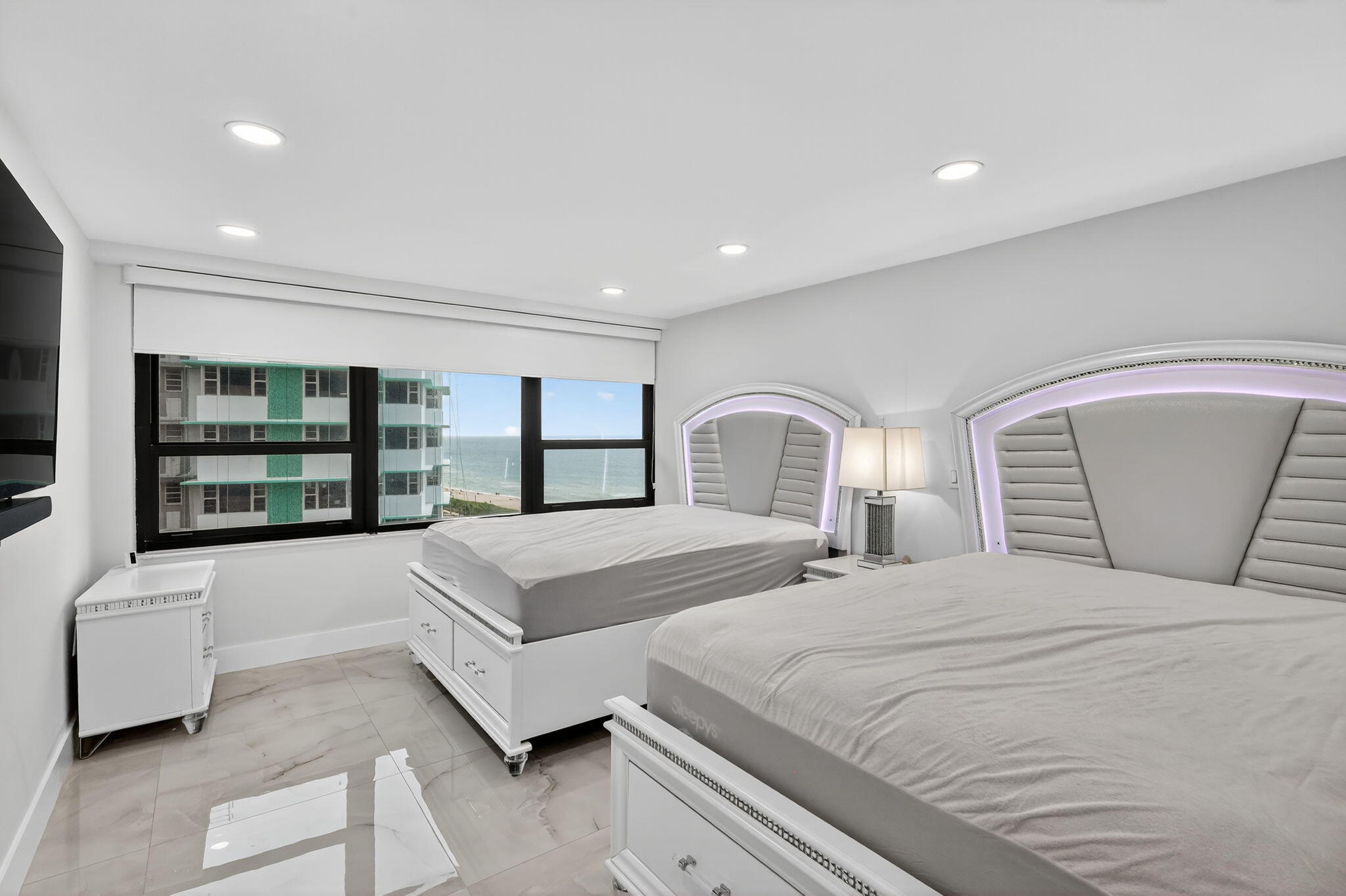 5225 Collins Avenue, Unit 1408 Miami Beach, FL 33140 - Photo 11 of 37 a bedroom with bed and window