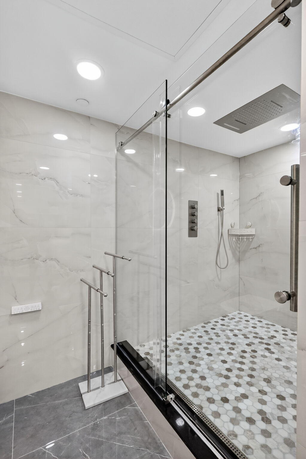 5225 Collins Avenue, Unit 1408 Miami Beach, FL 33140 - Photo 15 of 37 a bathroom with a shower