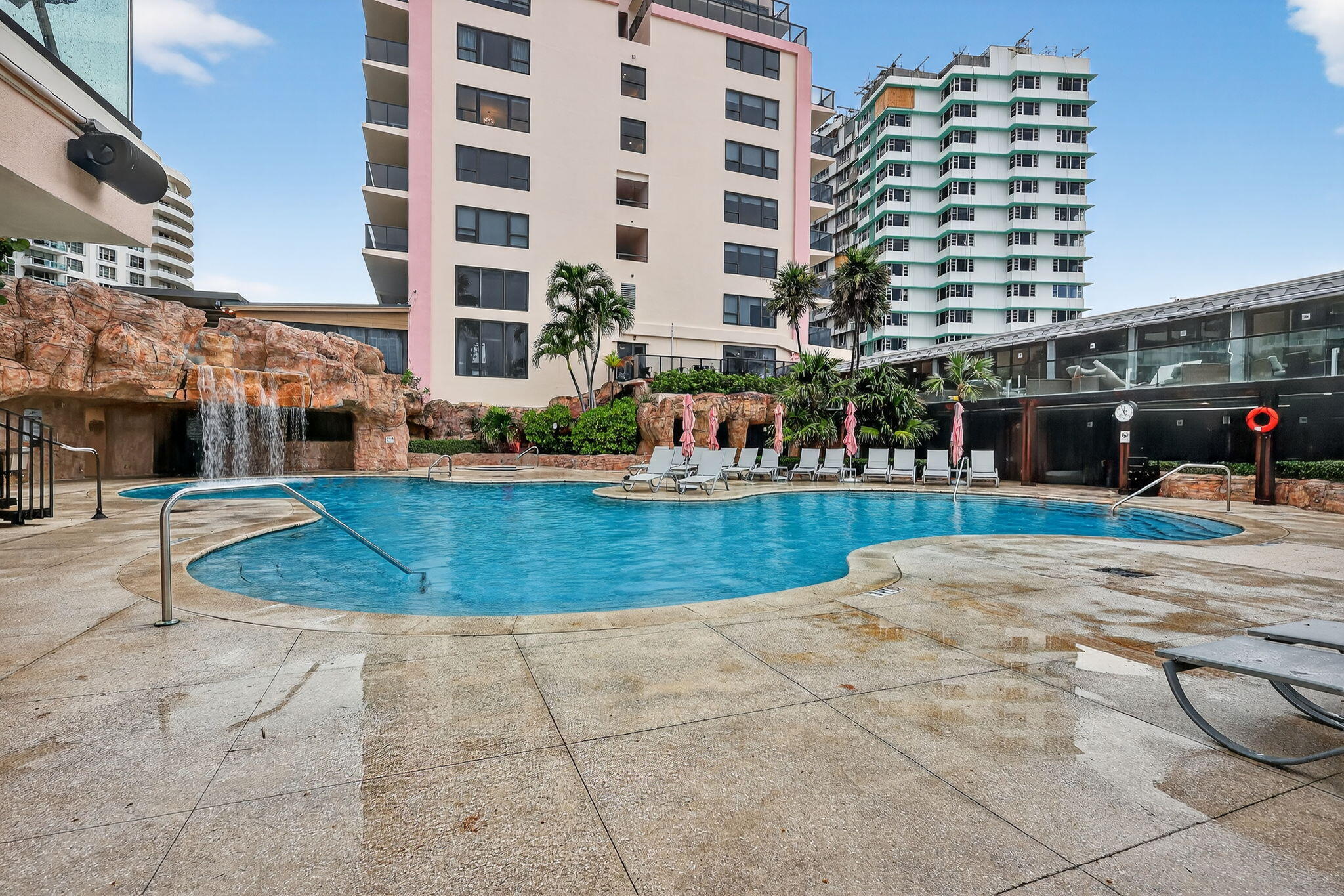 5225 Collins Avenue, Unit 1408 Miami Beach, FL 33140 - Photo 33 of 37 a view of building with yard