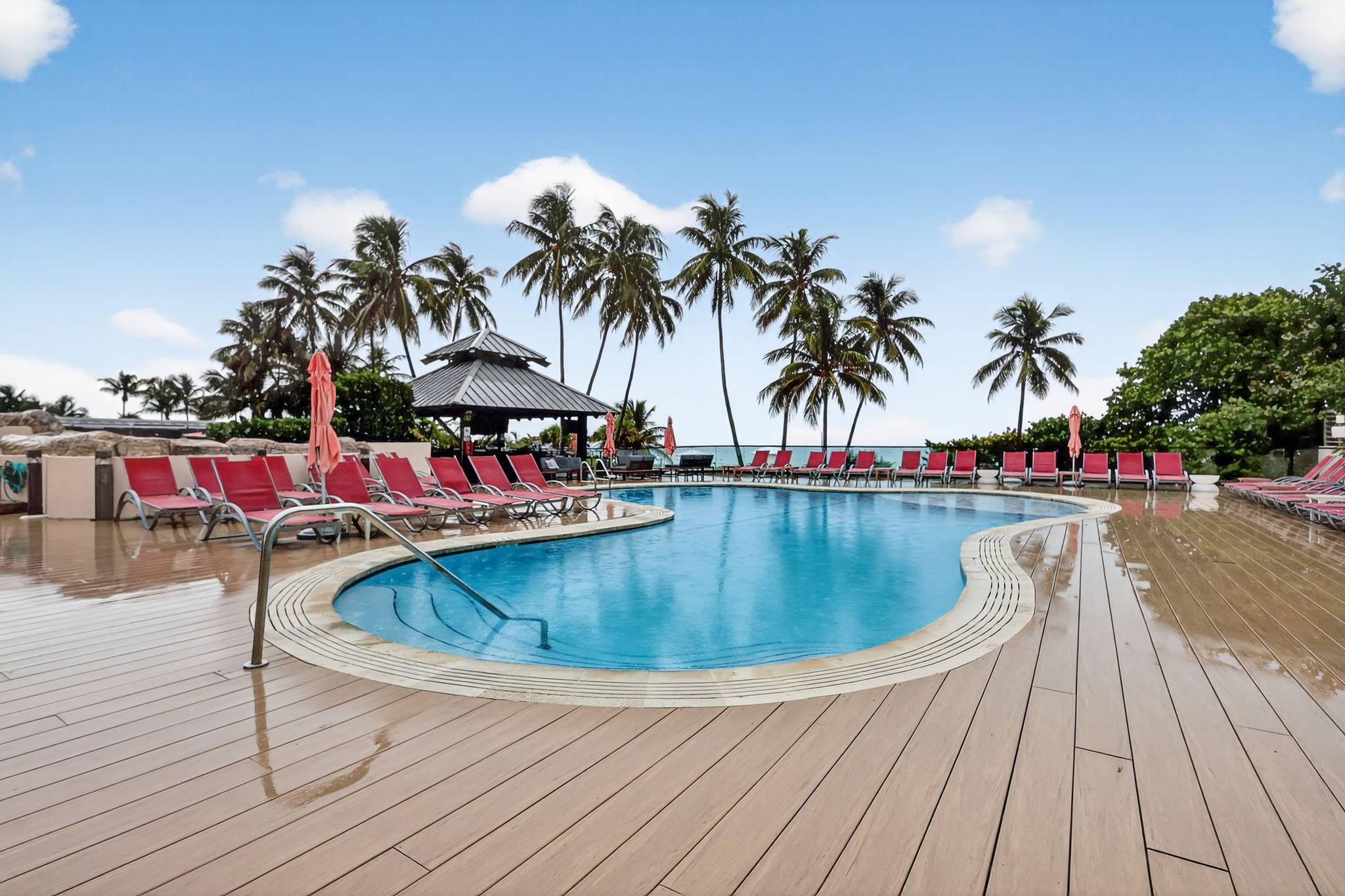 5225 Collins Avenue, Unit 1408 Miami Beach, FL 33140 - Photo 36 of 37 swimming pool with outdoor seating