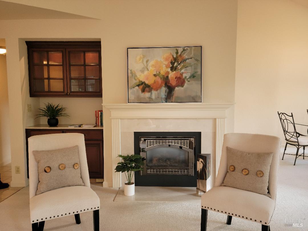 178 Pelican Lane Novato, CA 94949 - Photo 2 of 13 a living room with furniture and a fireplace
