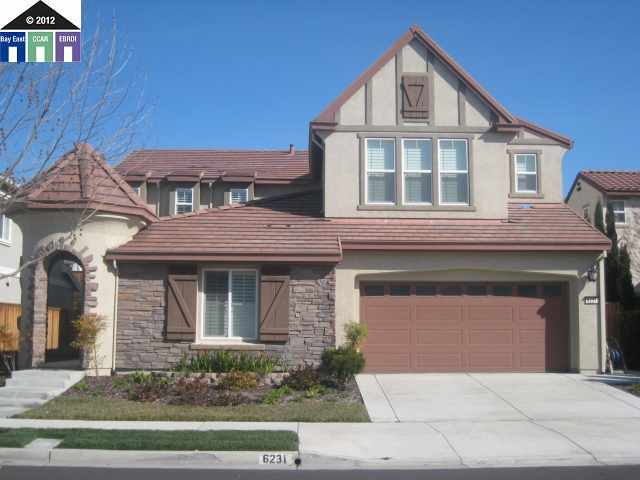 6231 Murdock Way San Ramon, CA 94582 - Photo 1 of 1 a front view of a house with garage and plants