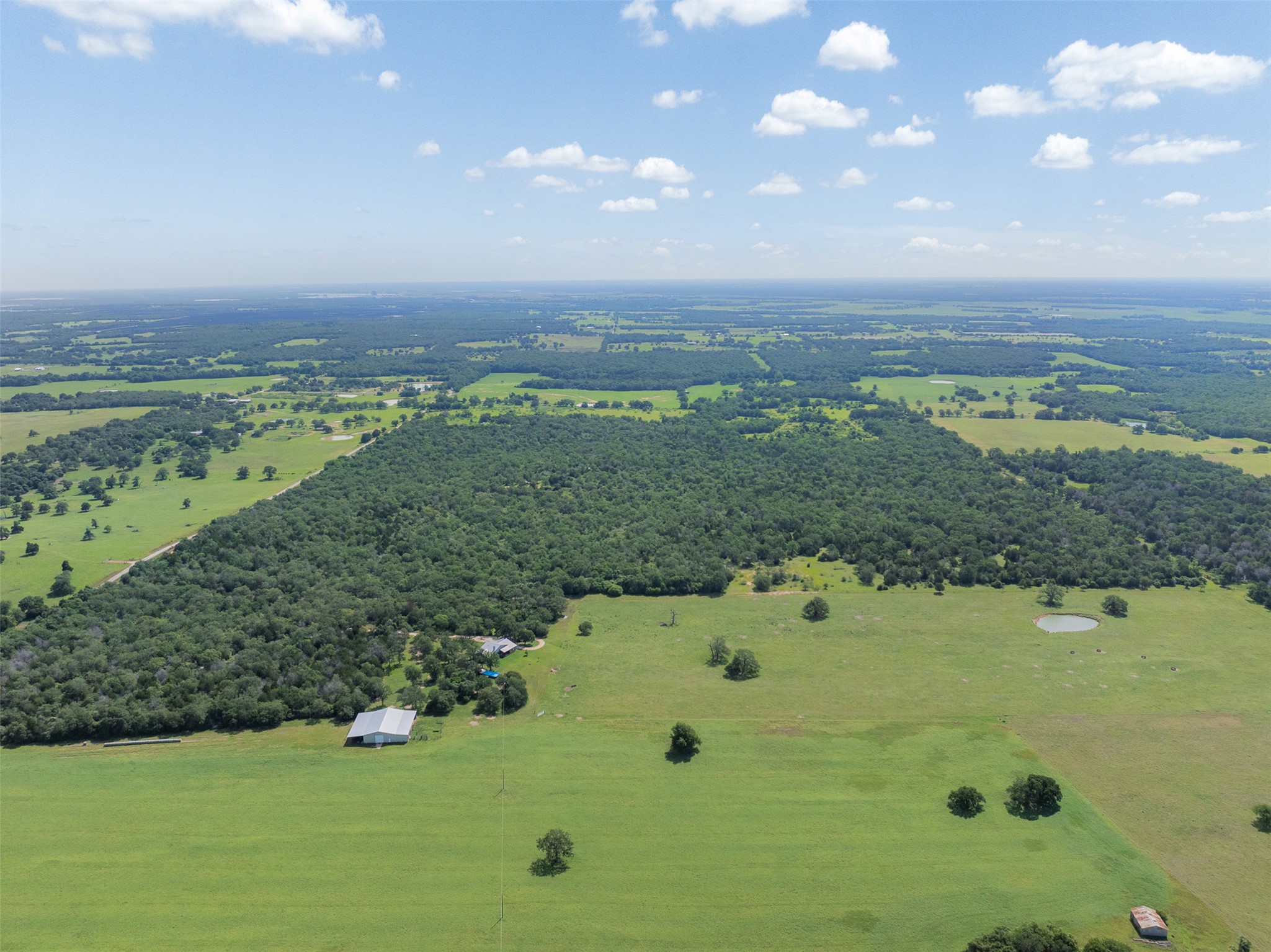459 County Road 459 Road Thorndale, TX 76577 - Photo 22 of 35 a view of a lake with a yard