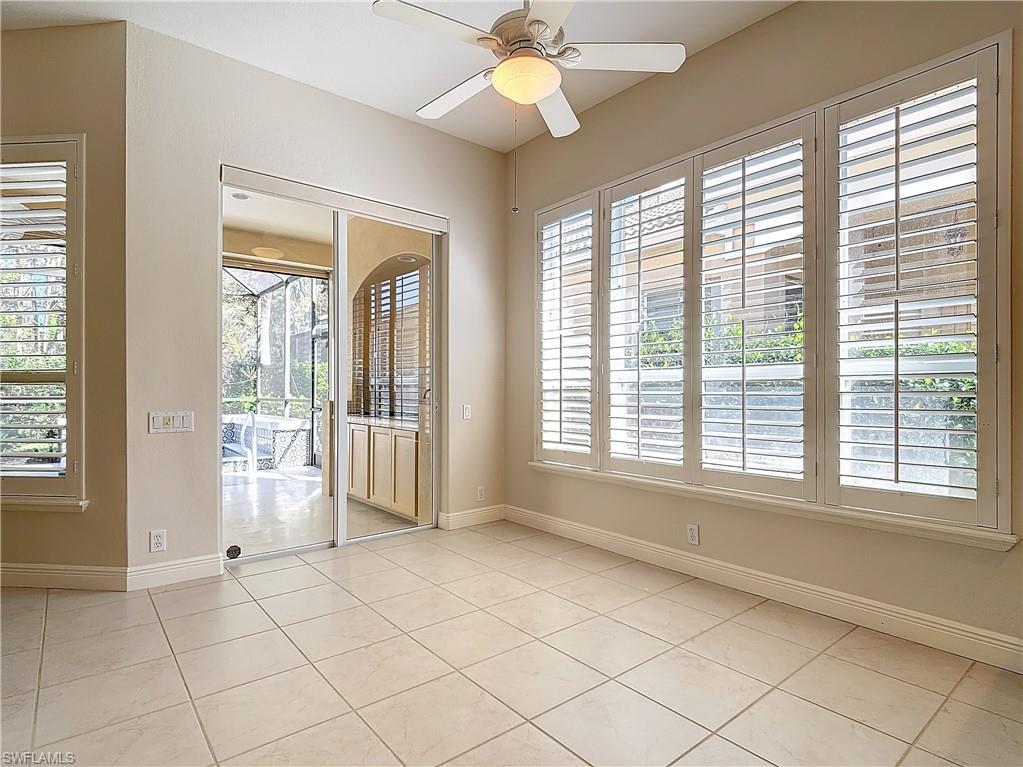 9190 Troon Lakes Drive Naples, FL 34109 - Photo 14 of 50 a view of an empty room with a window