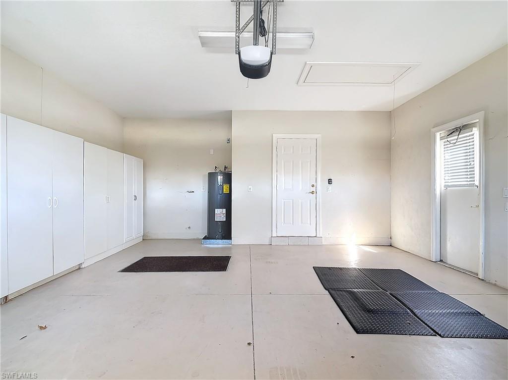 9190 Troon Lakes Drive Naples, FL 34109 - Photo 40 of 50 a view of an empty room and window