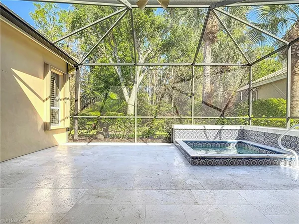 a view of indoor pool and sitting area
