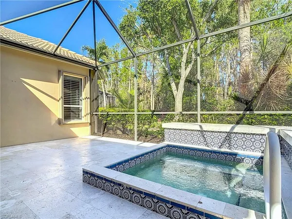 $999,000 | 9190 Troon Lakes Drive, Naples, FL 34109