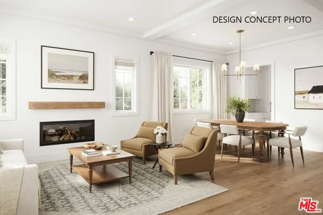 a living room with furniture dining table and a fireplace