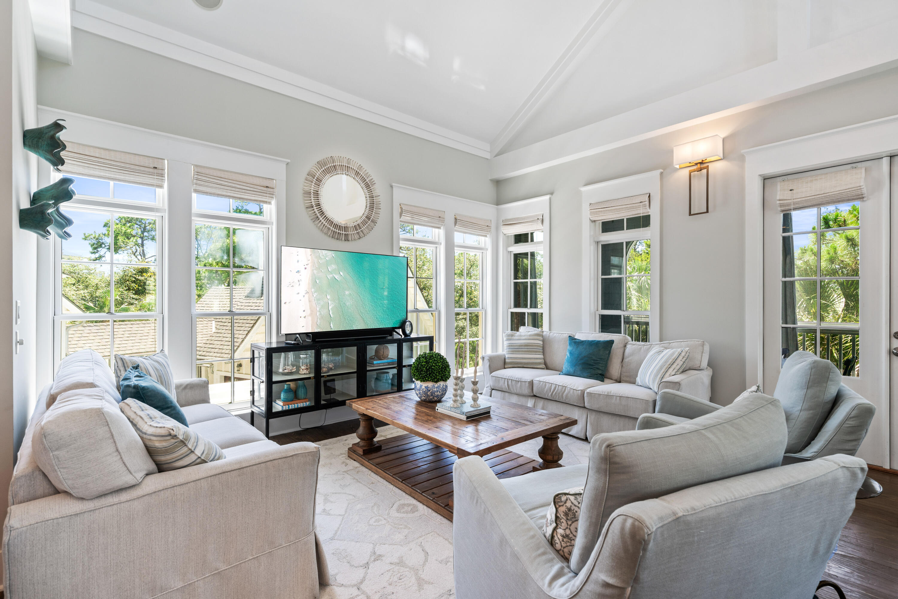 148 Coopersmith Lane Inlet Beach, FL 32461 - Photo 45 of 82 a living room with furniture a fireplace and floor to ceiling windows