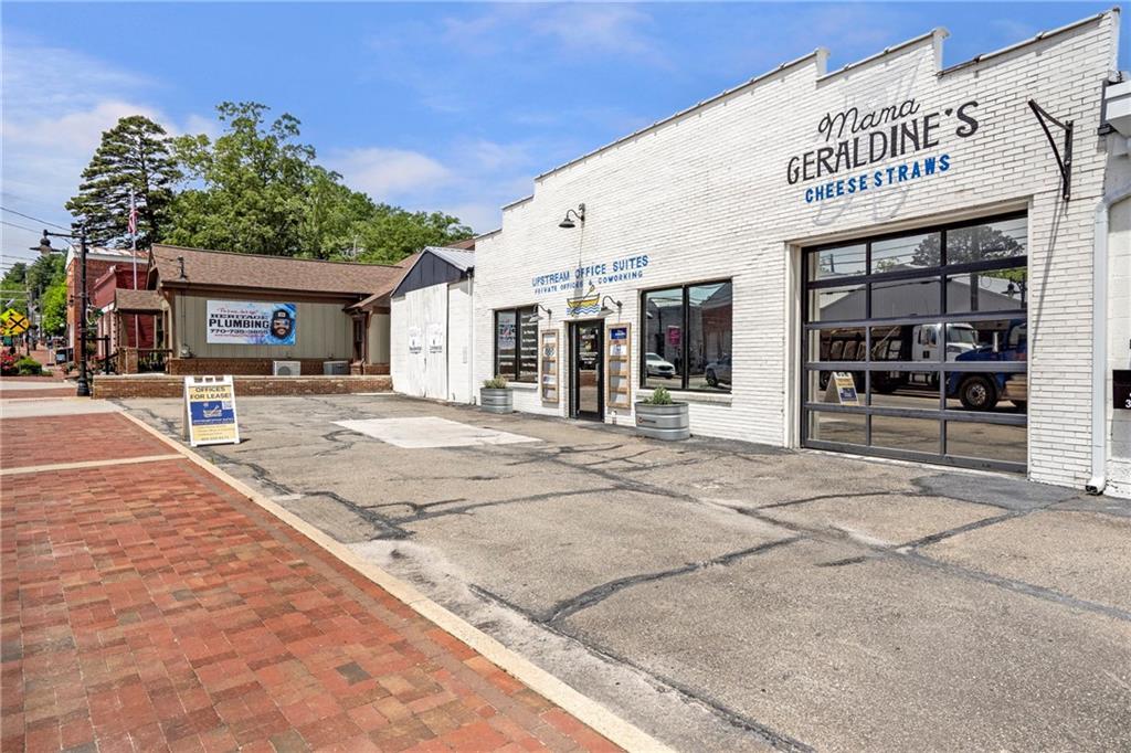 660 Groover Street Ball Ground, GA 30107 - Photo 44 of 53 a view of a building with sitting area